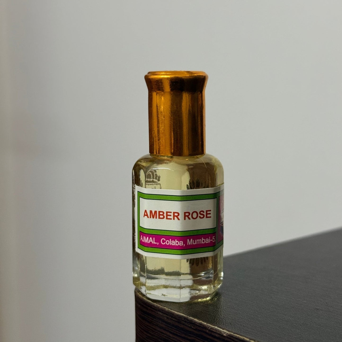Ajmal Amber Rose Attar – Premium Decants (1ml, 2ml, 3ml, 6ml) & 1 Tola Presentation - Perfume Pundit