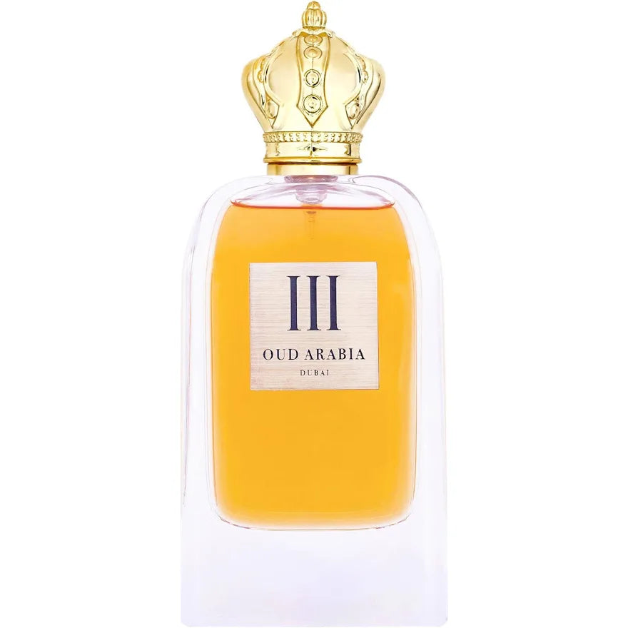 Oud Arabia III perfume bottle with golden amber liquid, a gold crown cap, and a white label on a white background.