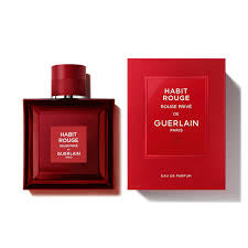 Guerlain Habits Rouge Eau de Parfum bottle in deep red glass next to its red packaging box, set against a clean white background.